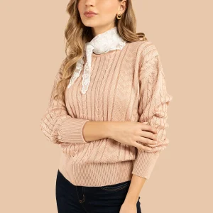 Buzo color palo de rosa con cuello redondo y textura trenzada 101932
